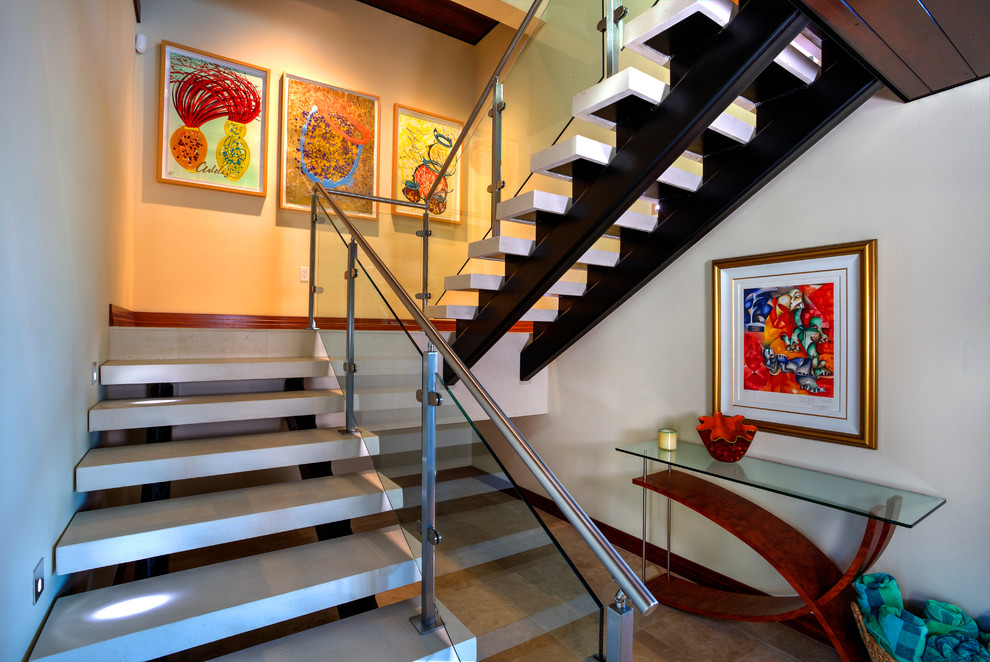 This is an example of a medium sized modern concrete l-shaped staircase in Tampa with concrete risers.