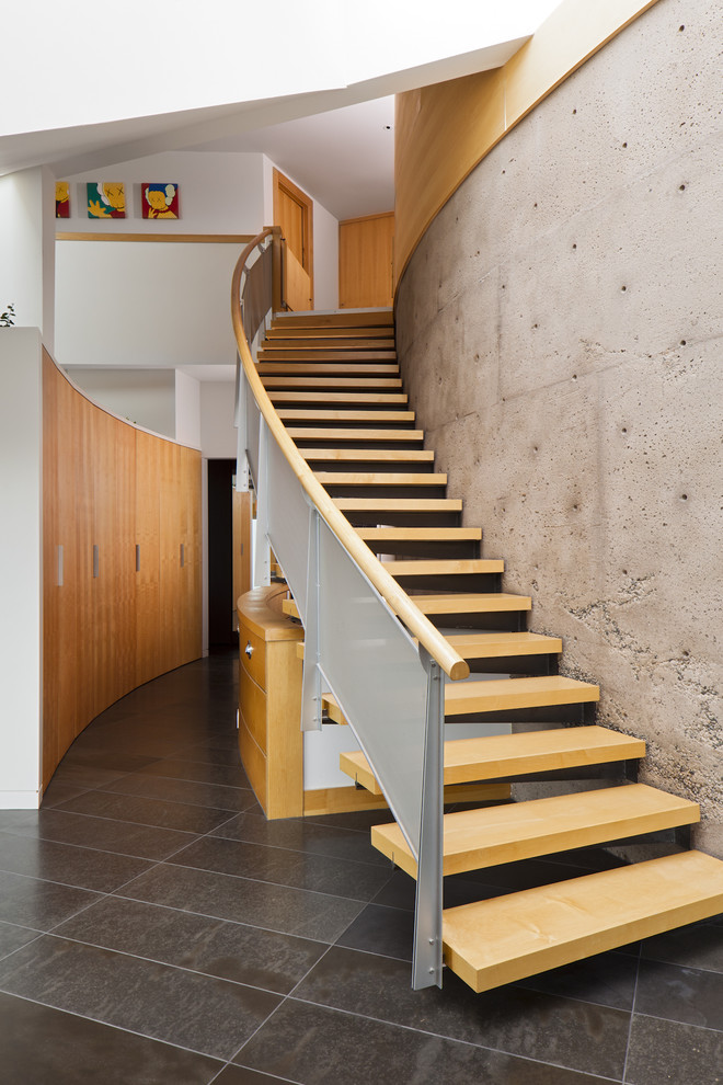 Design ideas for a contemporary staircase in Vancouver with open risers.