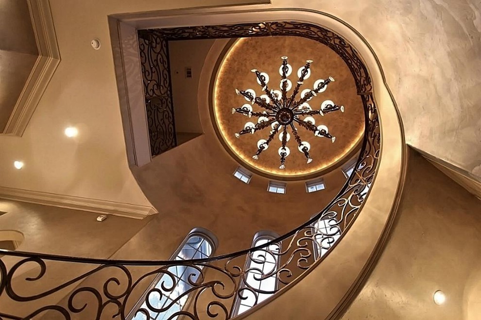 Inspiration for a mediterranean curved staircase in Houston.