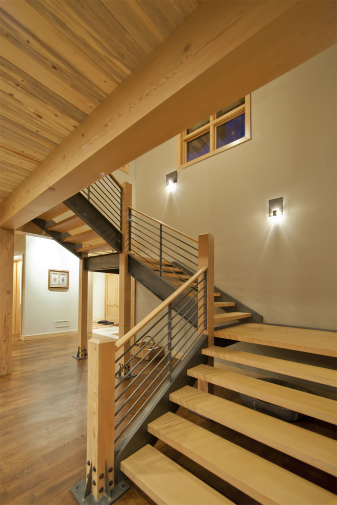 Design ideas for a contemporary staircase in Denver with open risers.