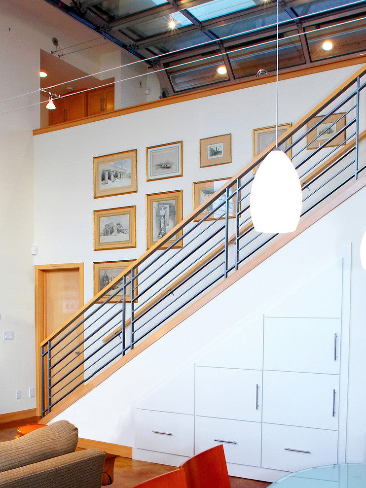 Inspiration for a mid-sized coastal straight mixed material railing staircase remodel in Seattle