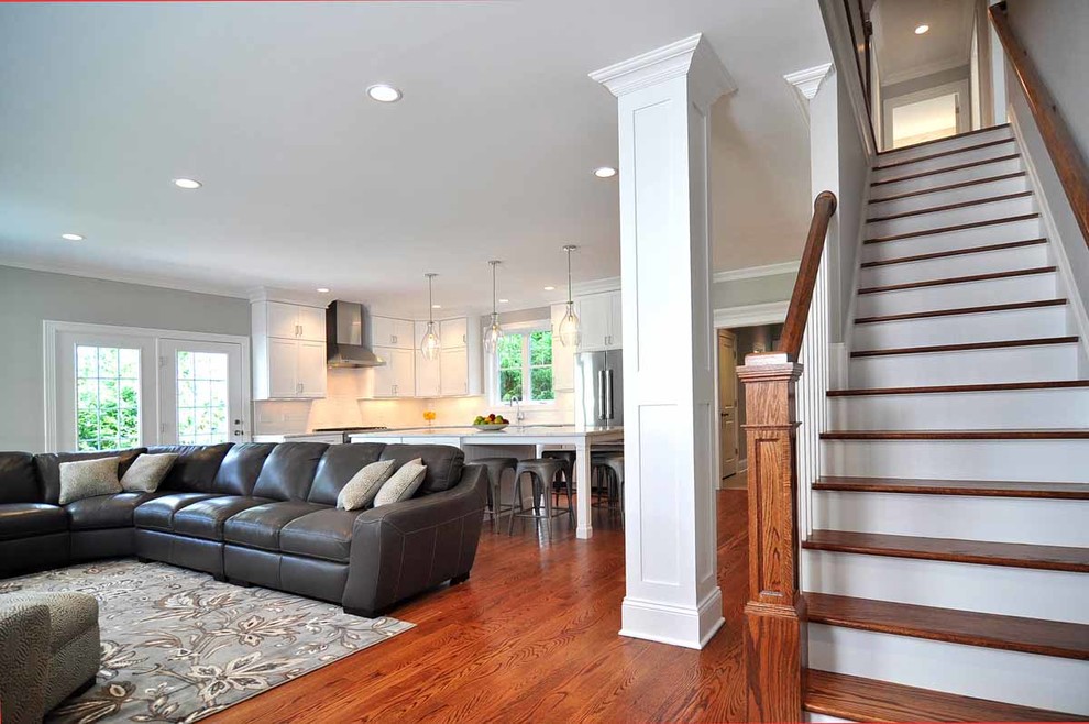 Inspiration for a mid-sized transitional painted straight wood railing staircase remodel in Bridgeport with painted risers