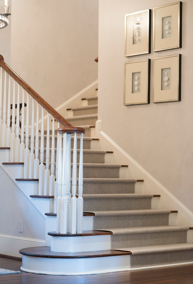 Example of a mid-sized transitional carpeted l-shaped staircase design in Charleston with carpeted risers