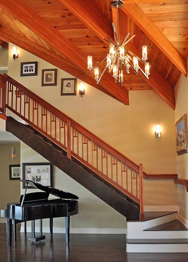 Inspiration pour un escalier droit design avec des marches en bois et des contremarches en bois.