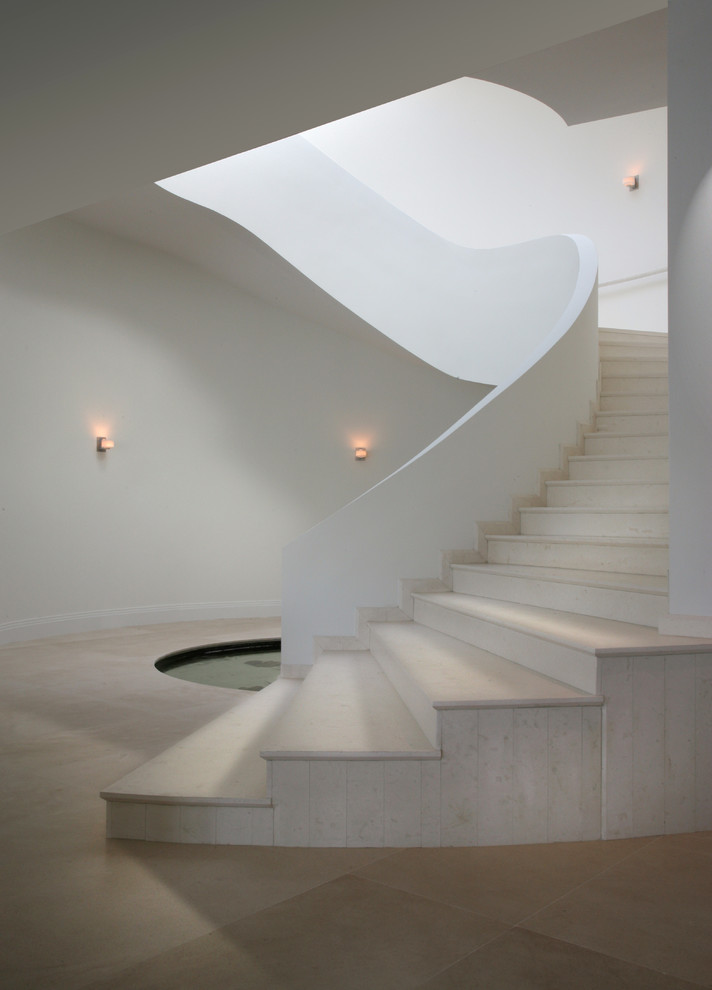 Large modern curved staircase in Miami.