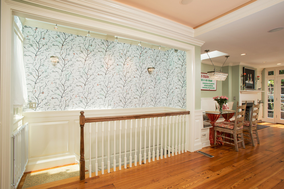 Photo of a medium sized classic carpeted straight wood railing staircase in DC Metro with wood risers.