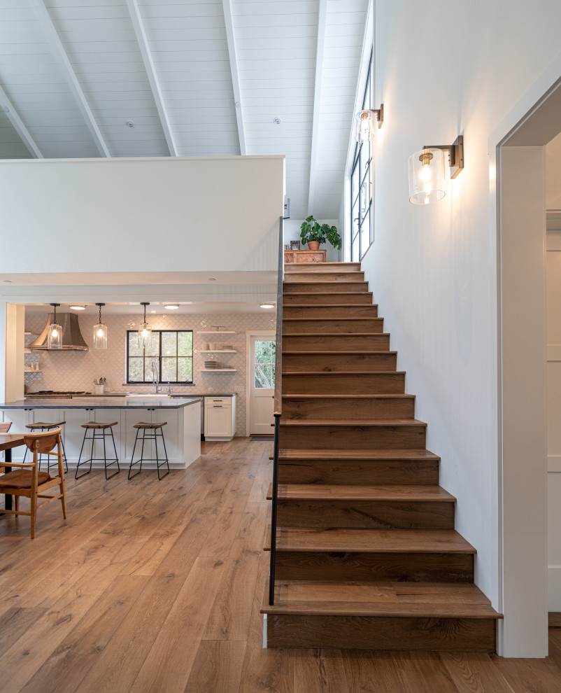 Example of a mid-sized minimalist staircase design in Santa Barbara