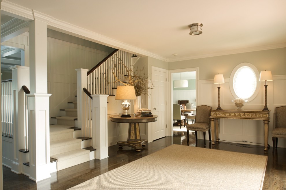 Example of a mid-sized classic wooden l-shaped staircase design in Boston with painted risers