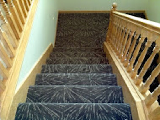 Inspiration for a large traditional carpeted u-shaped staircase in Wichita with carpeted risers.