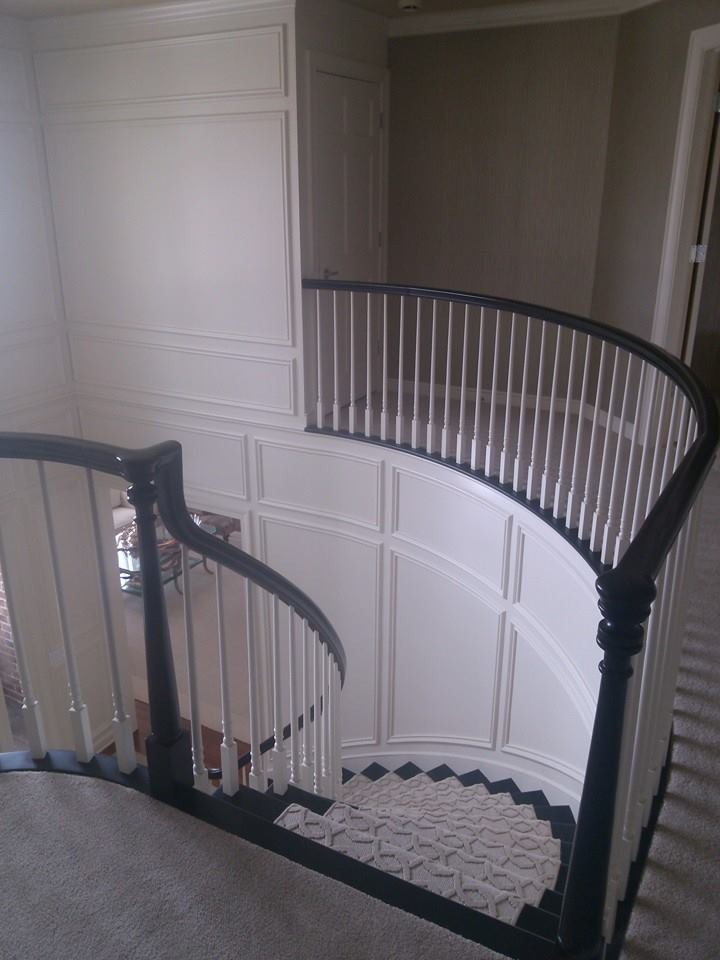 Staircase - painted spiral staircase idea in Minneapolis with carpeted risers