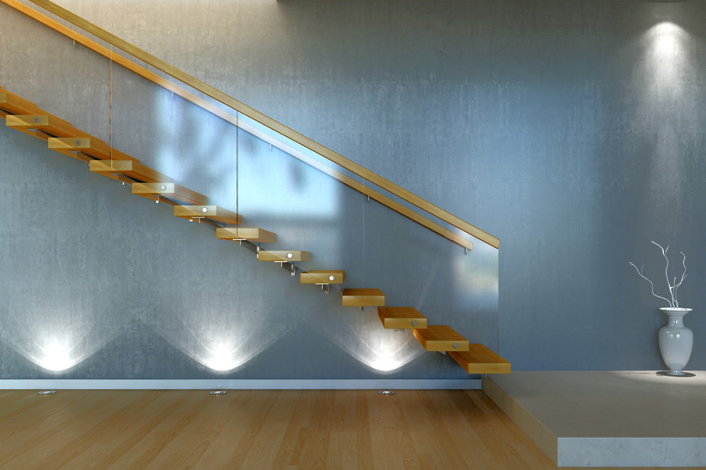 На фото: прямая лестница среднего размера в стиле модернизм с деревянными ступенями без подступенок