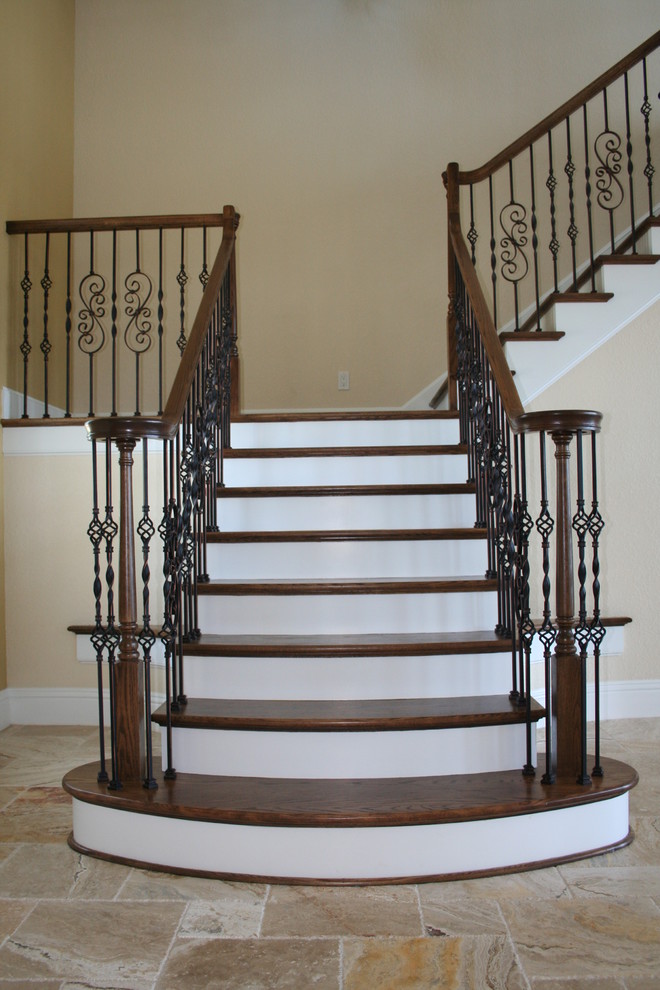 Inspiration for a medium sized mediterranean wood l-shaped staircase in Orlando with painted wood risers.
