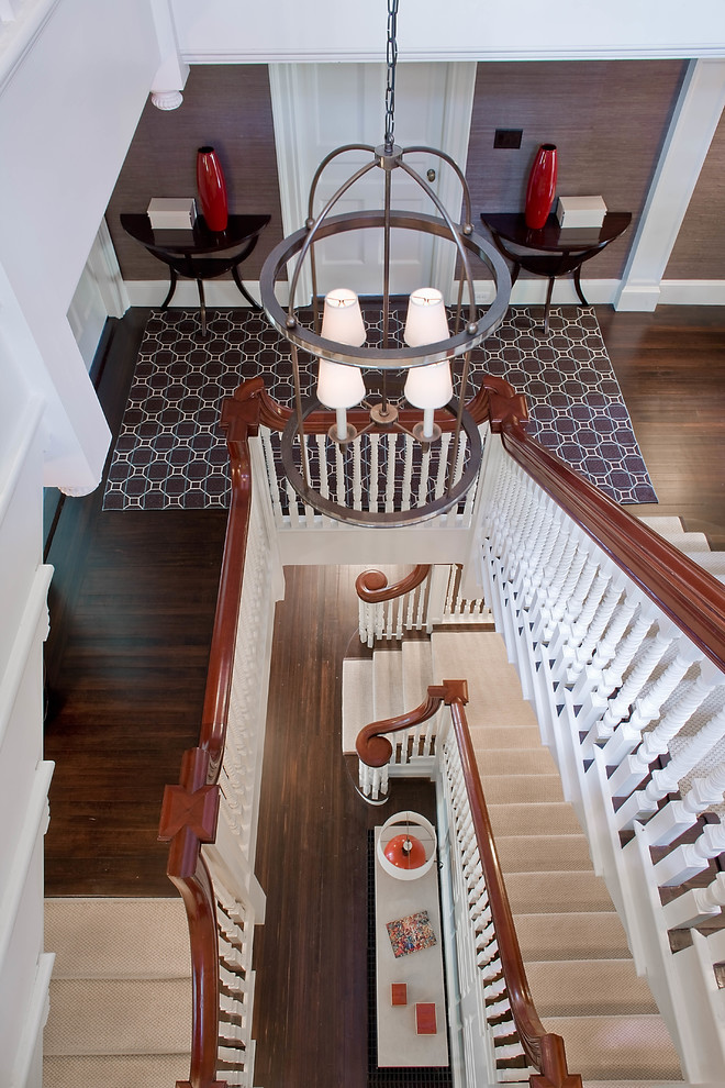 Inspiration for a medium sized traditional u-shaped wood railing staircase in Boston.
