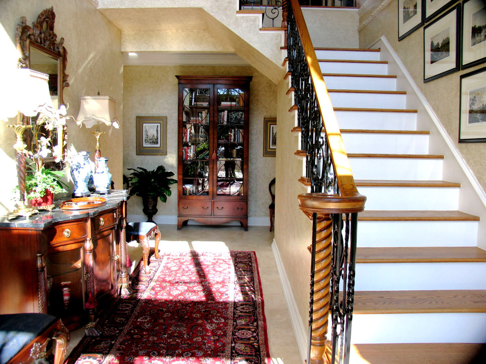 This is an example of a medium sized traditional wood straight staircase in Dallas with wood risers.