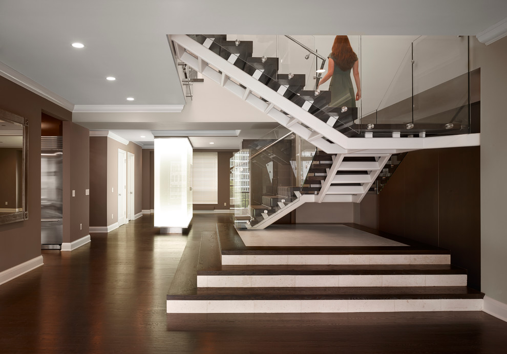 Inspiration for a modern wooden open staircase remodel in Chicago