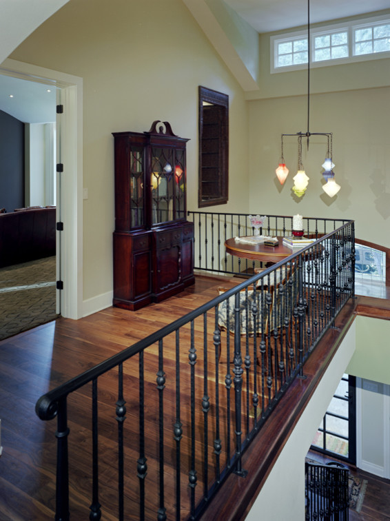 Photo of a medium sized traditional wood straight metal railing staircase in Austin with wood risers.