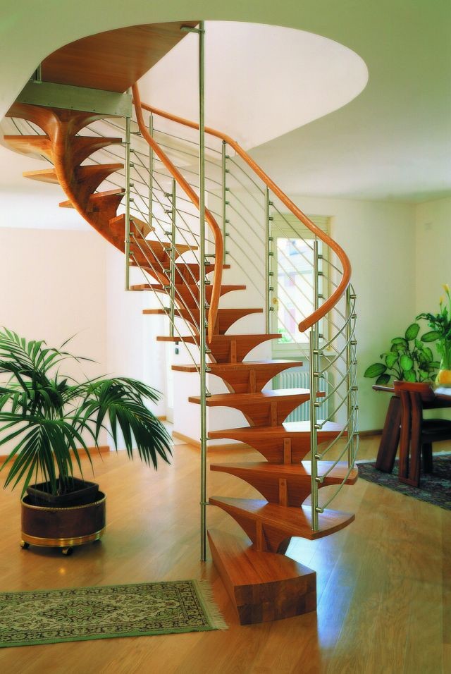 Modern staircase in Other with feature lighting.
