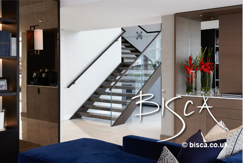 This is an example of a large contemporary straight staircase in London.