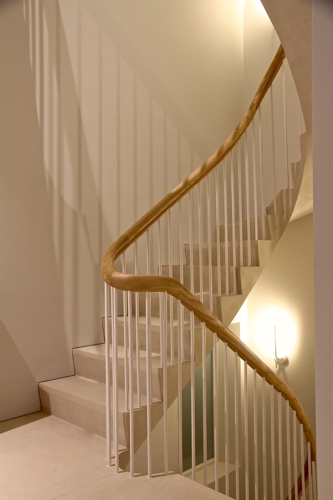 Idée de décoration pour un grand escalier design en U.