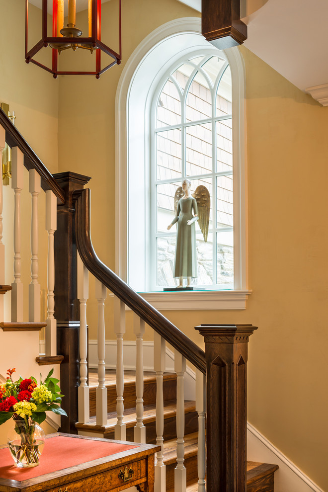 Inspiration for a large traditional wood l-shaped staircase in Philadelphia with wood risers.