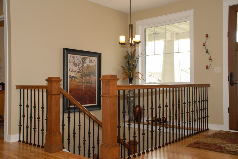 Example of an arts and crafts staircase design in Minneapolis