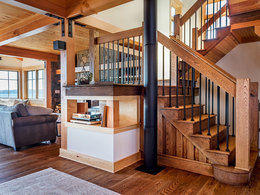 Large mountain style wooden u-shaped mixed material railing staircase photo in Boston with wooden risers