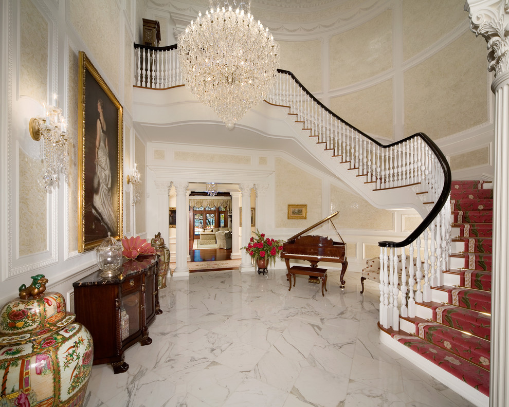 Photo of a traditional wood curved staircase in Tampa.