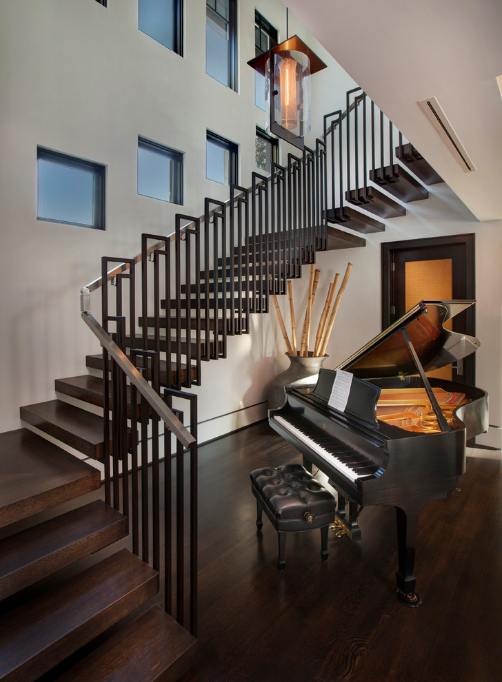 Photo of a contemporary wood l-shaped staircase in Orlando with open risers.