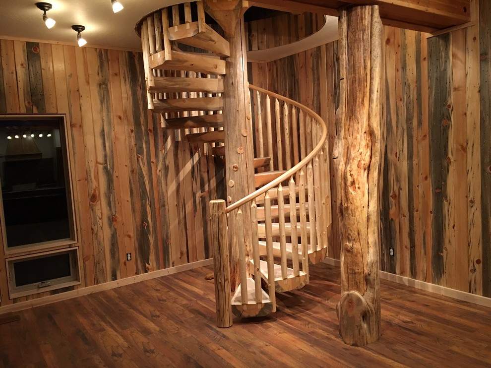 Inspiration for a mid-sized rustic wooden spiral open and wood railing staircase remodel in Denver