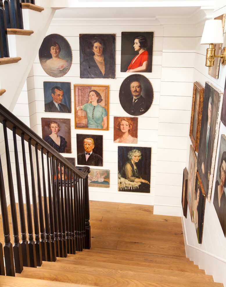 Example of a mid-sized cottage wooden u-shaped wood railing staircase design in Los Angeles
