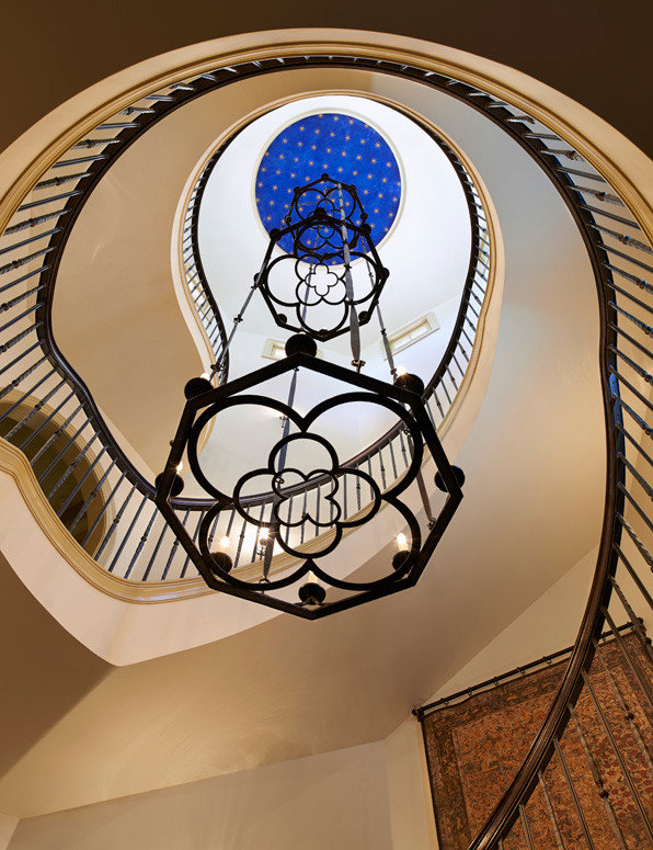 Large eclectic spiral staircase in Denver.