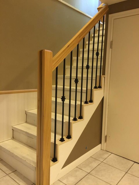 Poplar Handrail And Newel Post With Wrought Iron Spindles Modern Staircase Minneapolis By Struction Contracting Llc Houzz