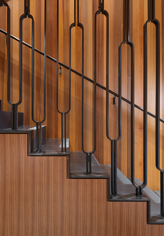 Inspiration for a modern metal u-shaped staircase in Seattle with metal risers.