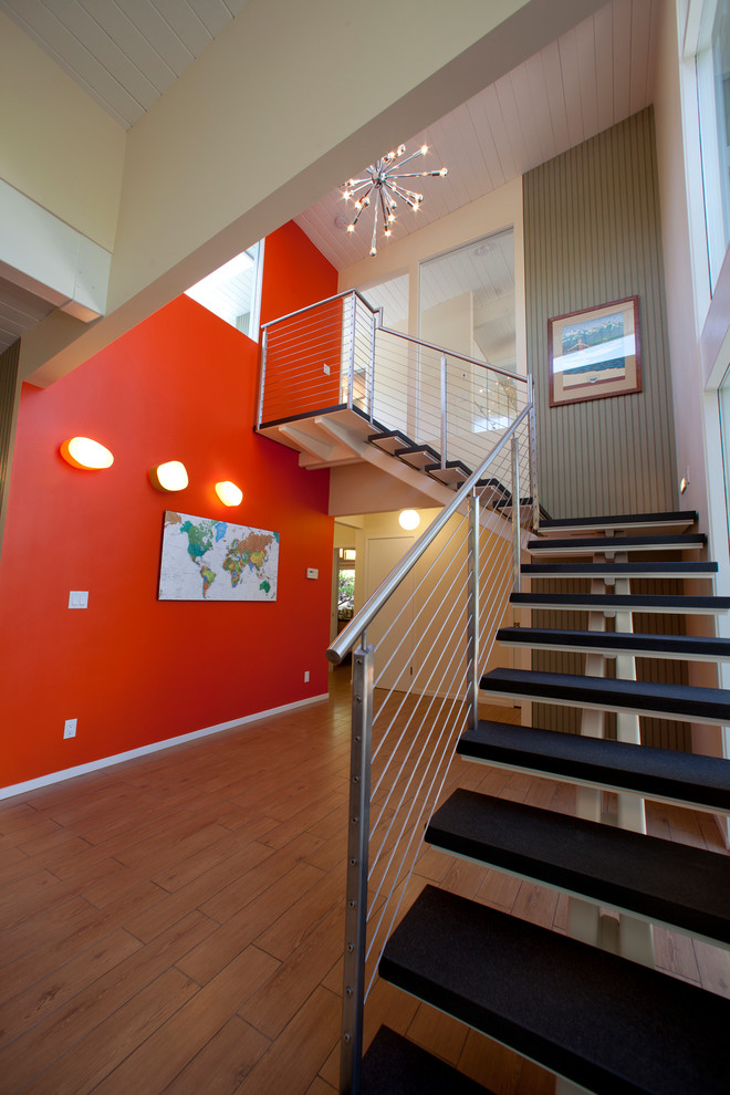 Contemporary staircase in San Francisco with open risers.