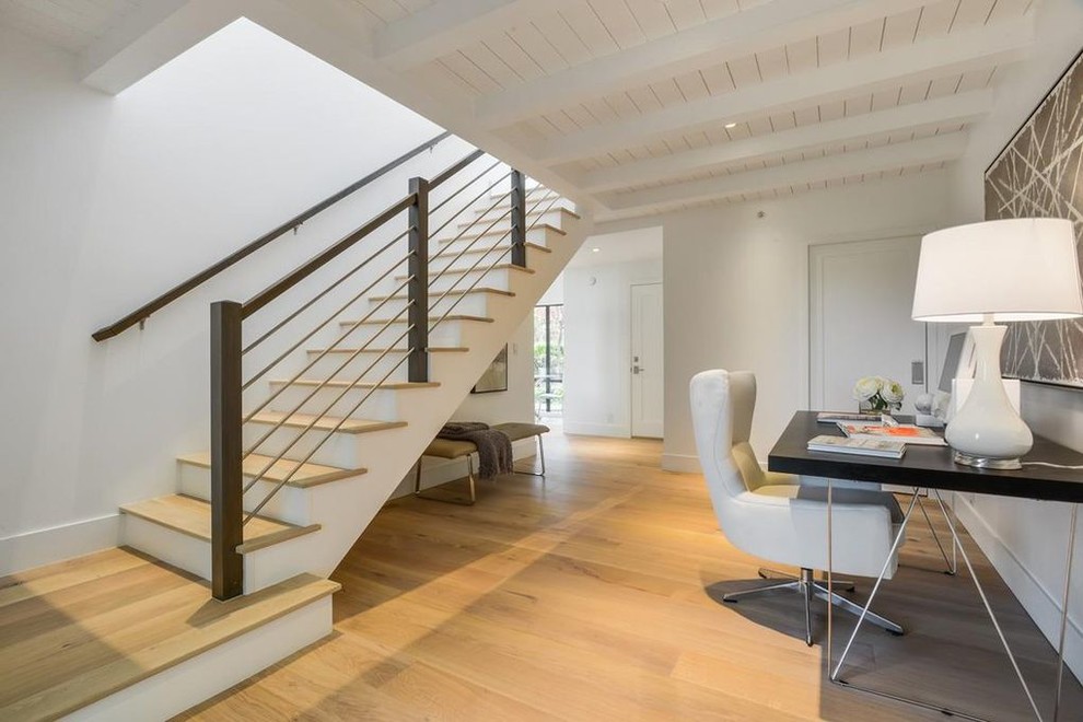 Design ideas for a large classic wood straight wire cable railing staircase in San Francisco with painted wood risers and feature lighting.