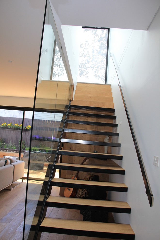 Inspiration for a small scandi wood straight staircase in Melbourne with open risers.