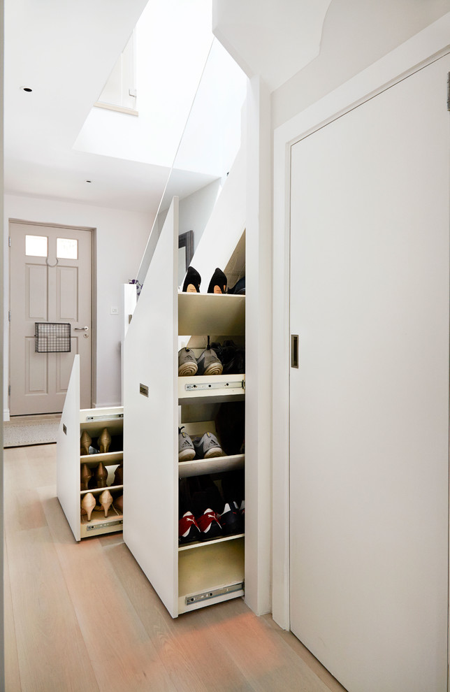 Example of a trendy straight staircase design in London