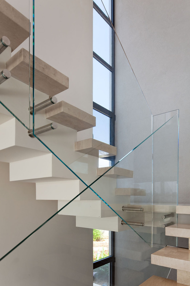 На фото: лестница на больцах в стиле модернизм