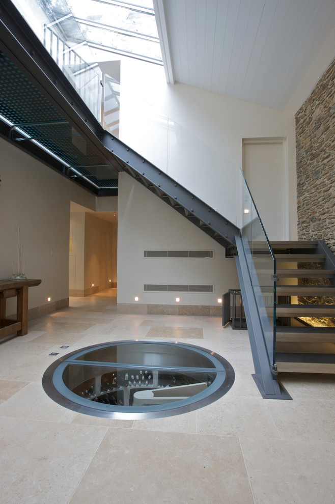 Inspiration for a contemporary wood l-shaped staircase in Wiltshire with open risers.