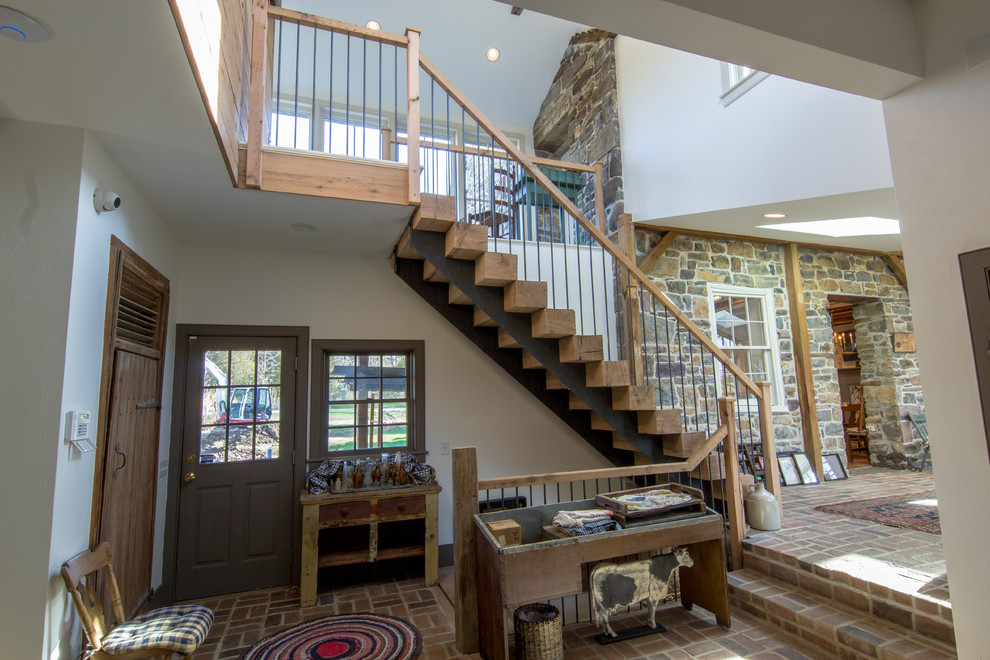 Mid-sized cottage wooden straight wood railing staircase photo in Other with wooden risers