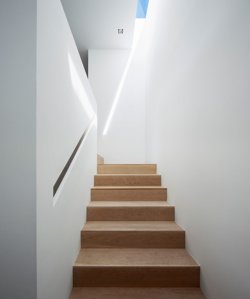 Inspiration for a medium sized contemporary wood l-shaped staircase in Los Angeles.