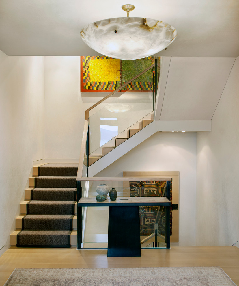 This is an example of a contemporary wood staircase in San Francisco with wood risers.