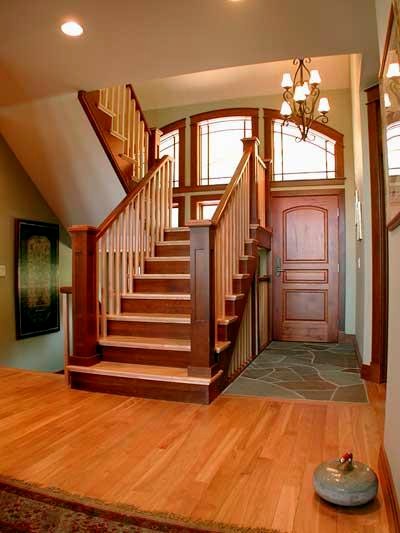 Imagen de escalera en L rústica con escalones de madera y contrahuellas de madera