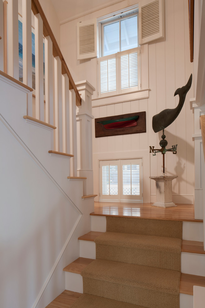 Staircase - mid-sized coastal wooden u-shaped staircase idea in Boston with painted risers