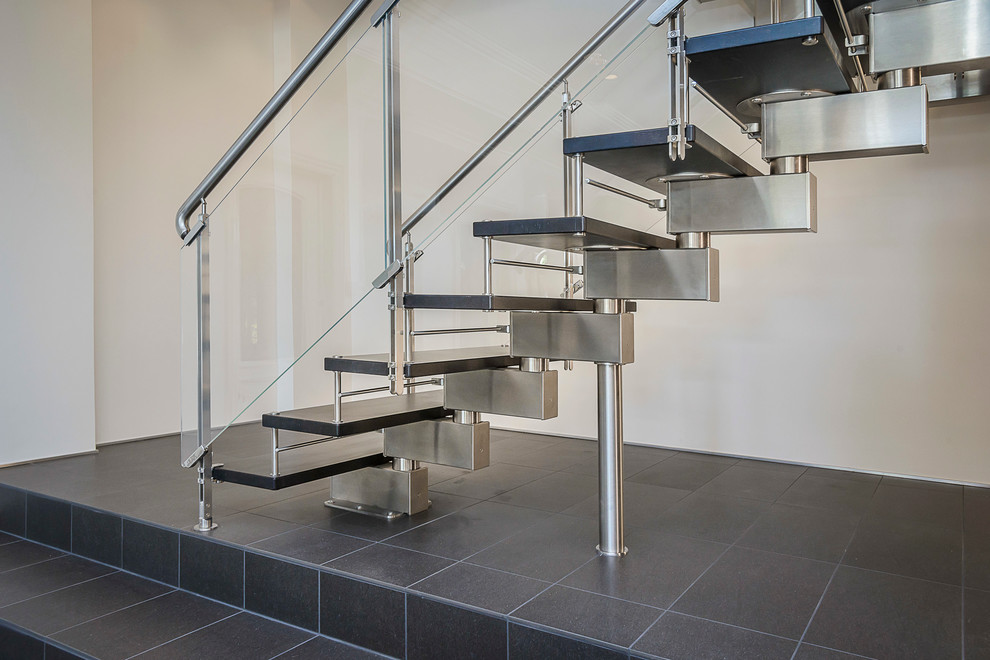 Design ideas for a contemporary wood l-shaped staircase in San Francisco with metal risers.