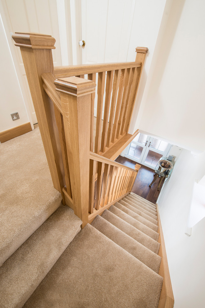This is an example of a contemporary straight staircase in Cheshire.