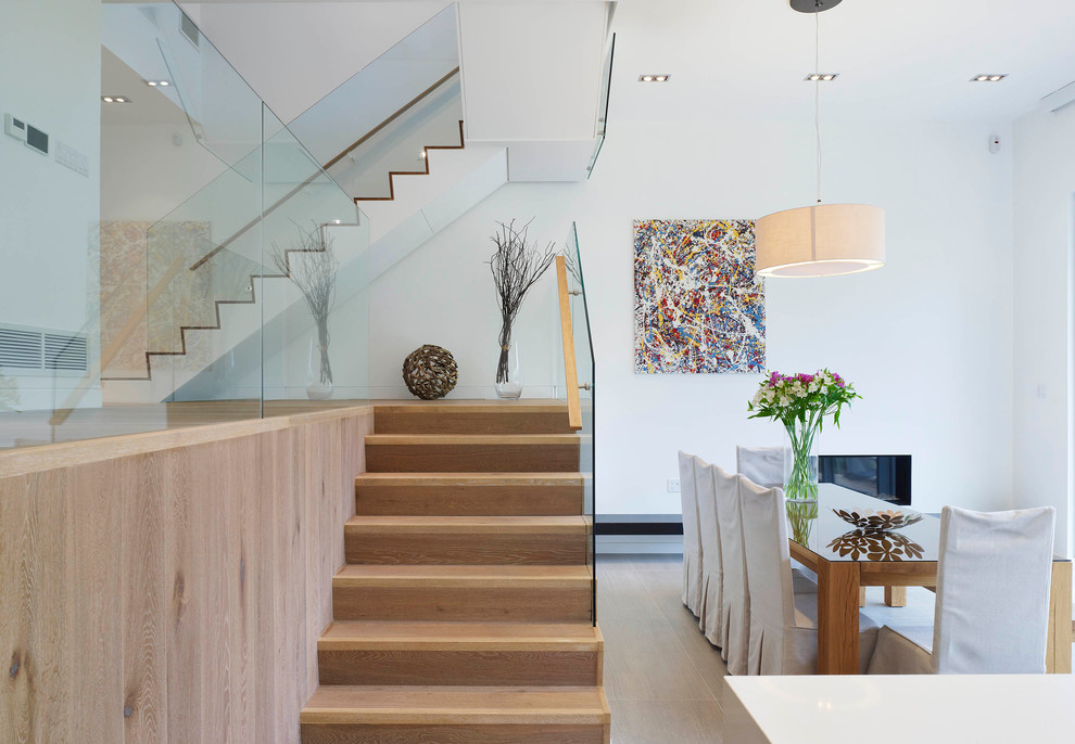 Design ideas for a contemporary wood staircase in Toronto.