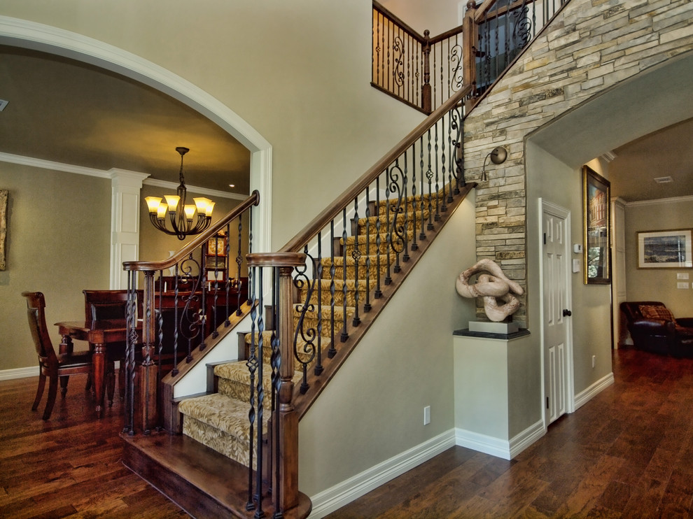 Inspiration for a mid-sized timeless carpeted l-shaped mixed material railing staircase remodel in Austin with carpeted risers