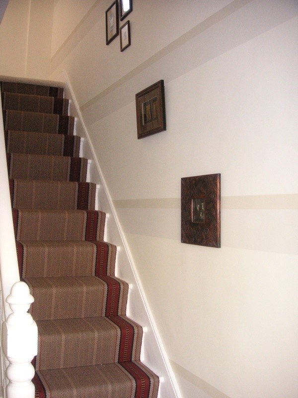 Inspiration for an eclectic straight staircase remodel in London