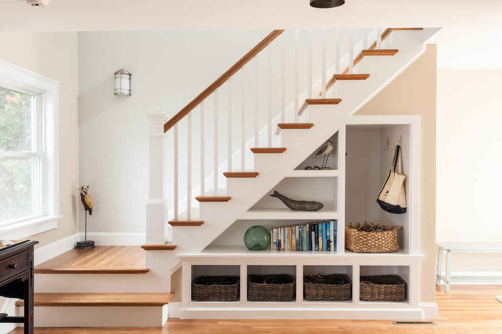 Staircase - coastal wooden staircase idea in Boston with painted risers